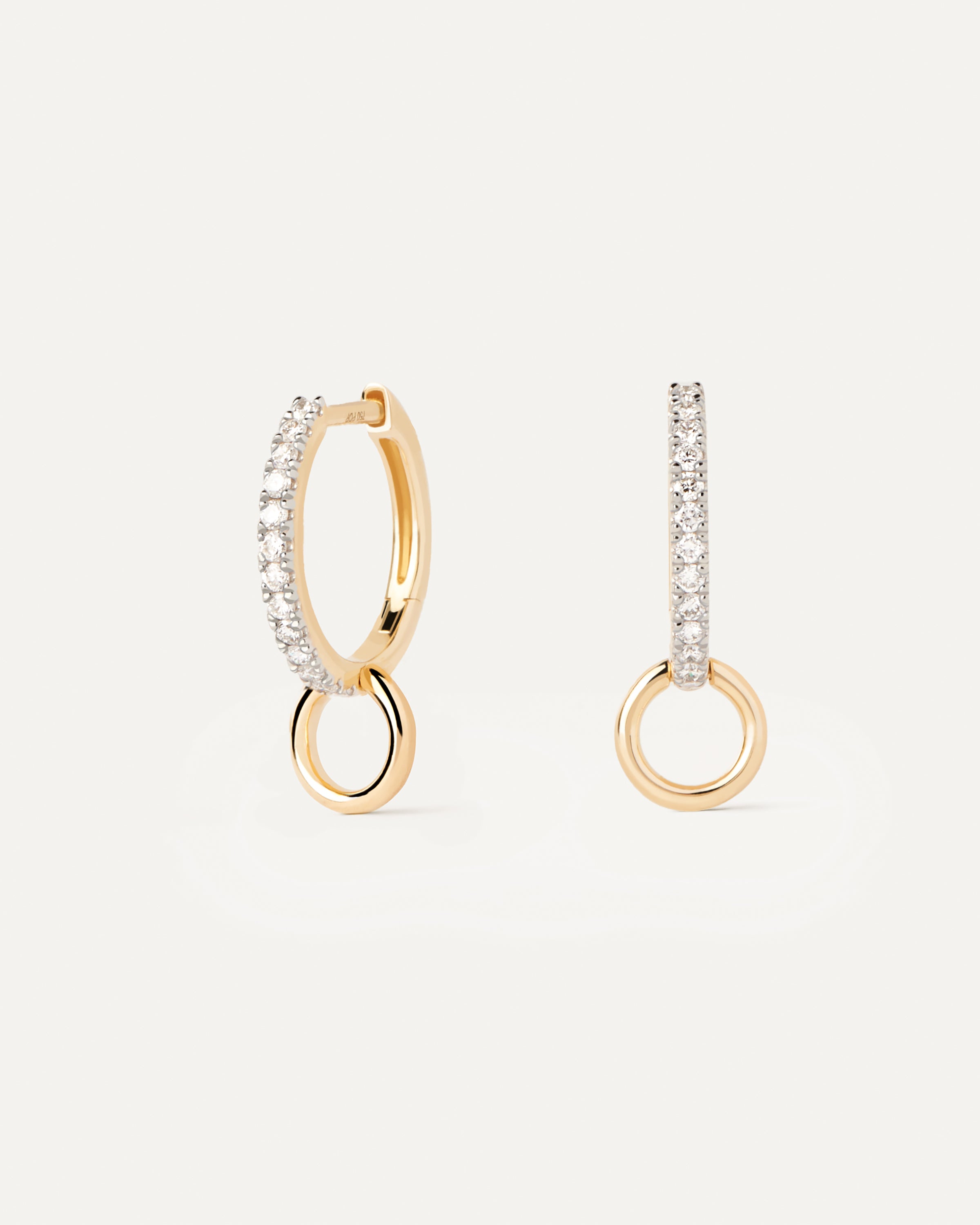 Aro único en oro con diseño circular y diamantes incrustados