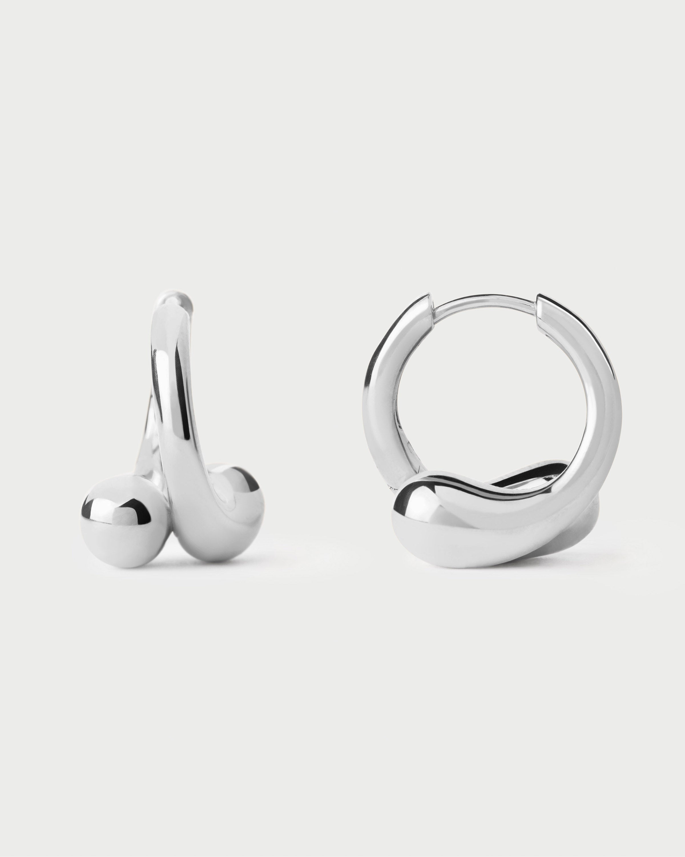 Aros Plateados de Diseño Continuo - Clásicos Elegantes en Plata de Ley 925